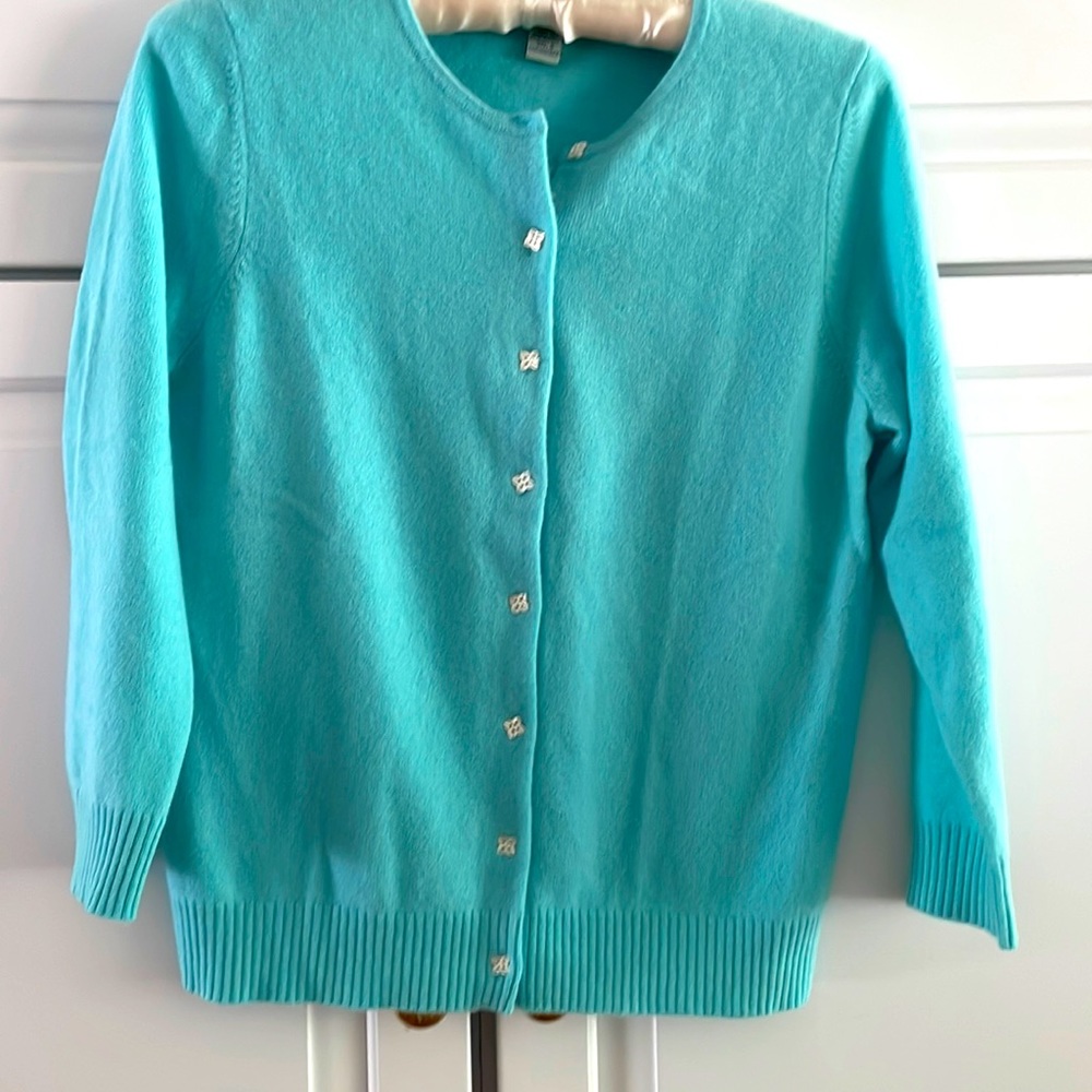 Aqua cashmere sweater with pearl buttons